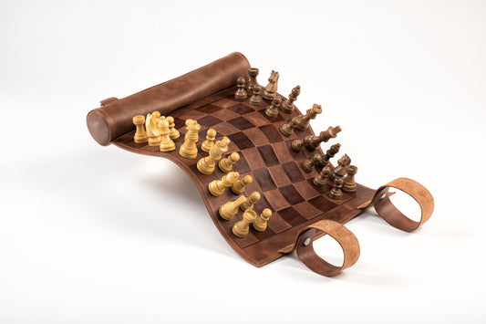 Wooden chess set with pieces on a white background