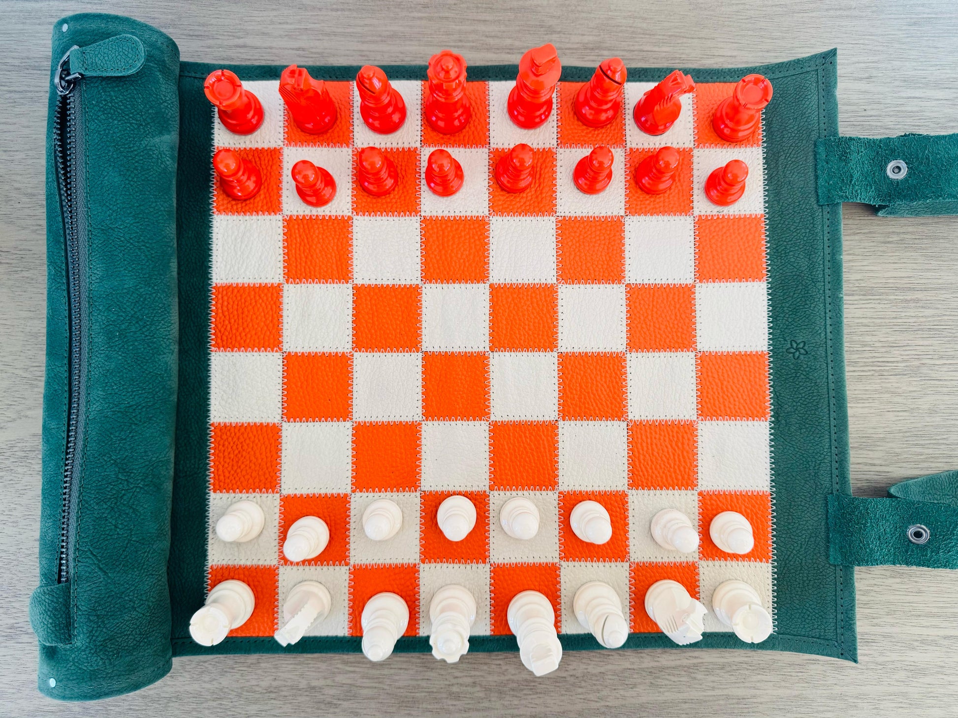 Top view of the Eire magnetic leather chess board with integrated storage