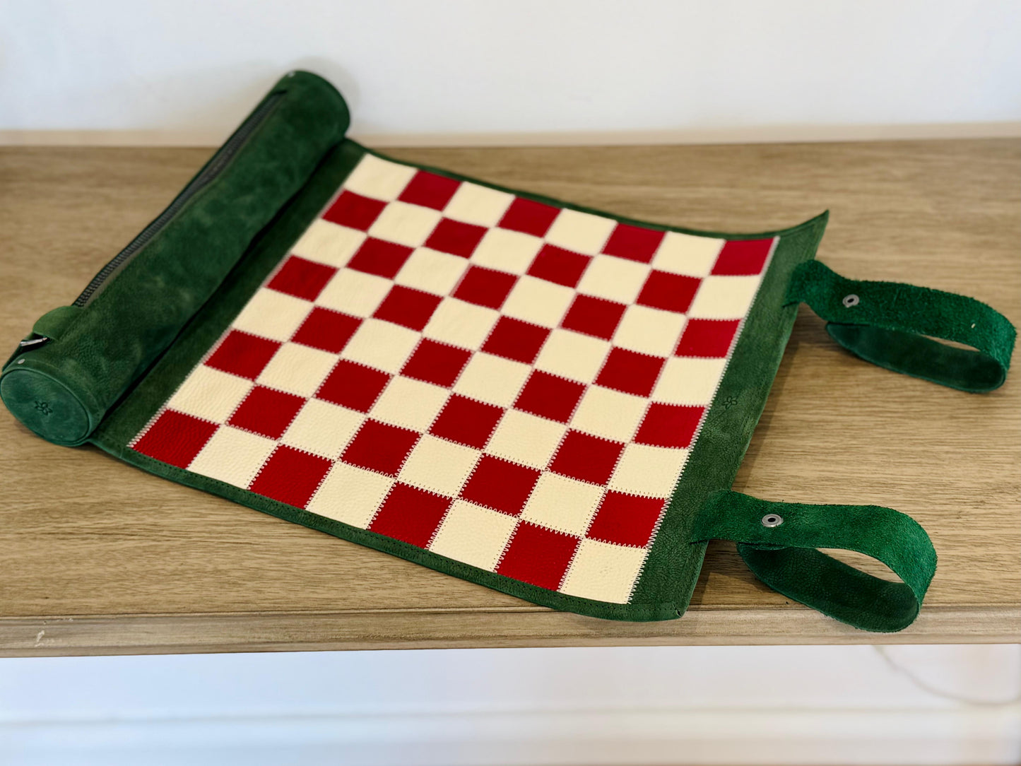 Portable roll-up leather chess board in teal green nubuck