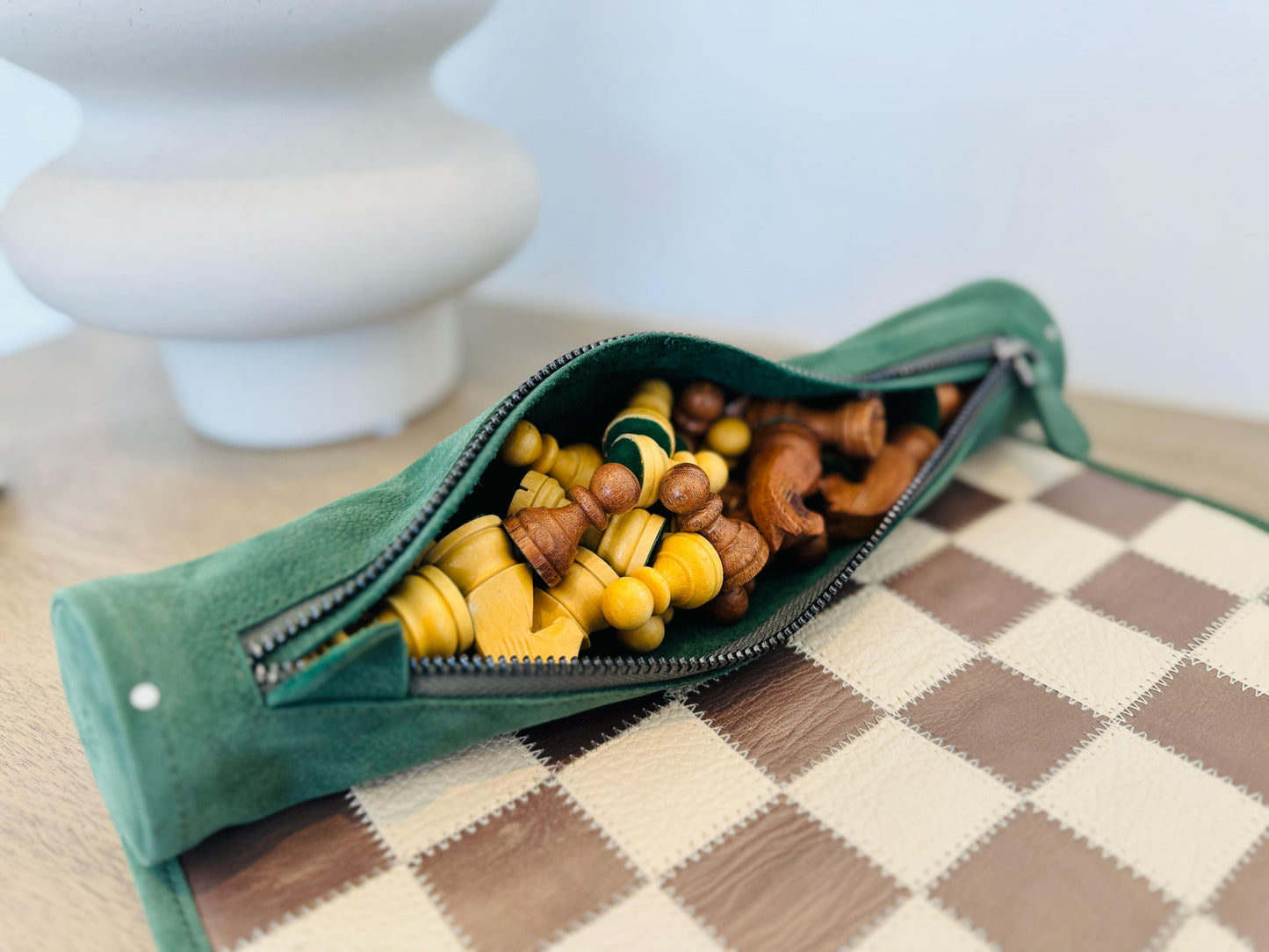 Grande Dame magnetic leather chess set with integrated leather storage compartment