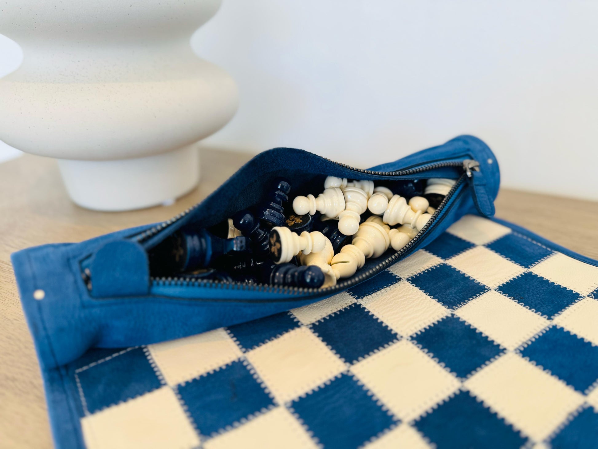 Integrated leather storage compartment of the Ocean Blue magnetic chess set